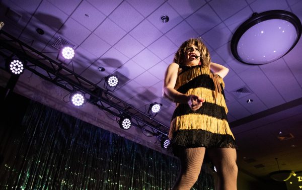 Drag performer and event host Veronica Electronika warms up the crowd in between performances at the 9th Annual WKU Housing and Residence Life Drag Show at Knicely Conference Center on April 4, 2024. 