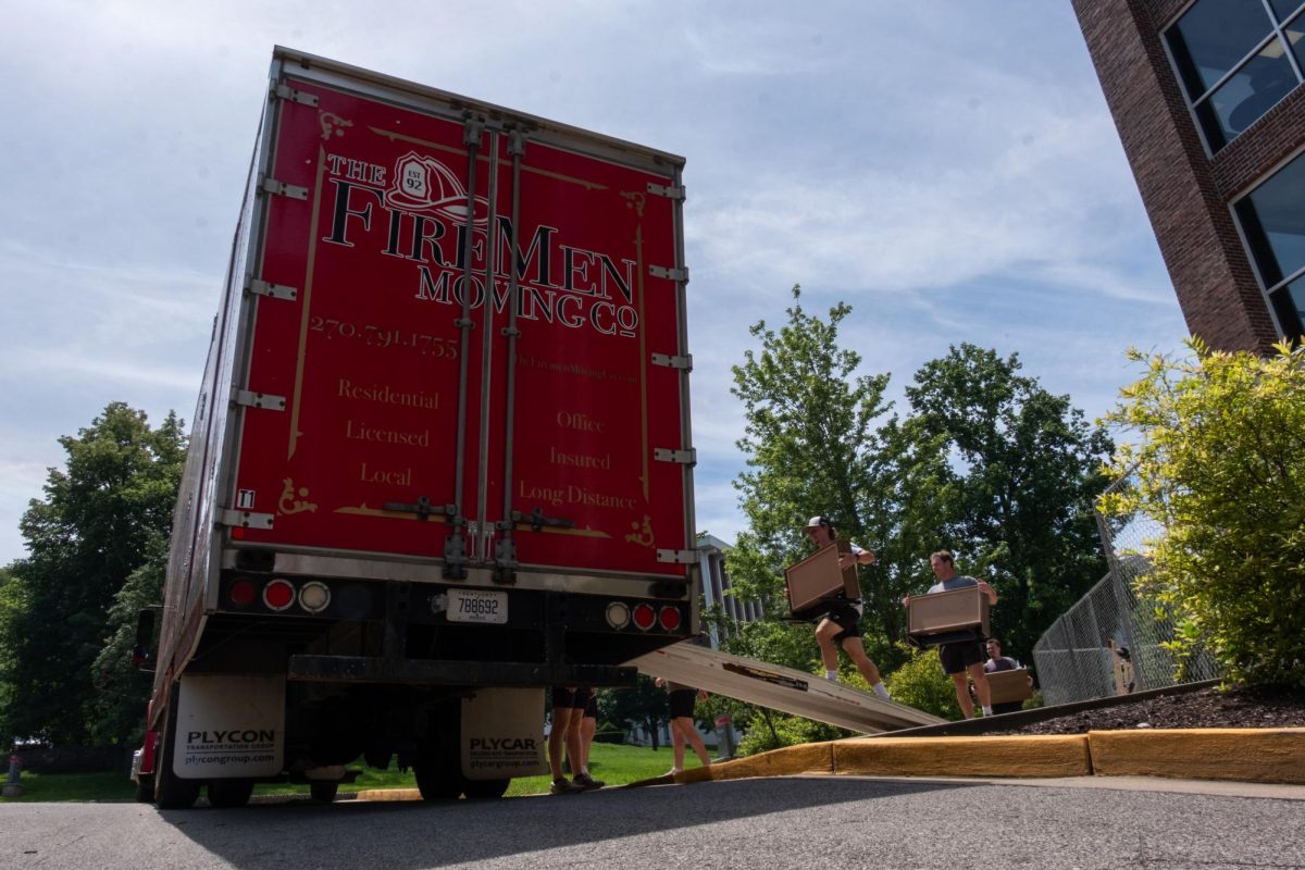Employees+for+the+Firemen+Moving+Company+move+furniture+out+of+Hilltopper+Hall+and+transport+them+to+Zacharias+Hall+on+Wednesday%2C+June+12.