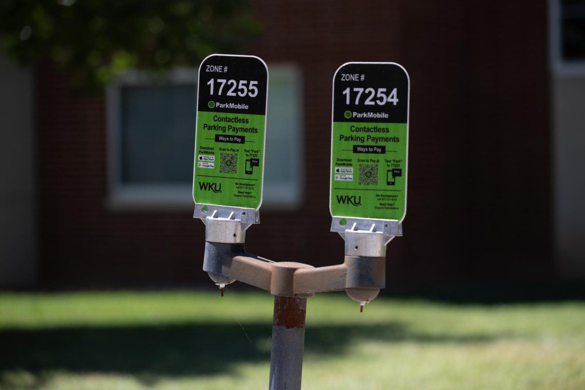 A new ParkMobile parking sign located on Normal Street, across from the Mahurin Honors College, on Monday.