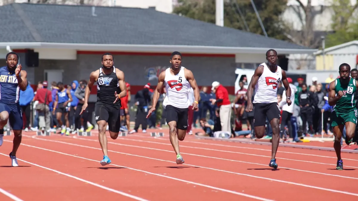 Former WKU Track and Field athlete Kyree King (middle) is slated to run for Team USA at the 2024 Paris Olympics. Photo provided by WKU Athletics.