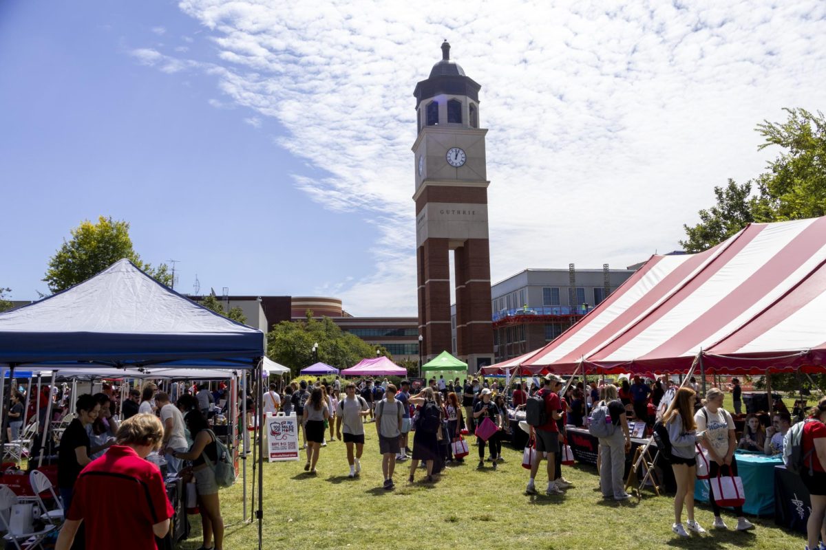 Students visit different vendors and interact with each other during WKU’s annual ‘Welcome Back WKU event held on South Lawn on Wednesday, Aug. 21, 2024. 
