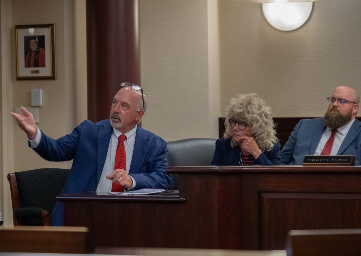 Chief Facilities Officer Bryan Russell (left) and Susan Howarth, executive vice president for Strategy, Operations and Finance, sought the regents approval on Friday for new agency bonds to complete large construction projects on campus.