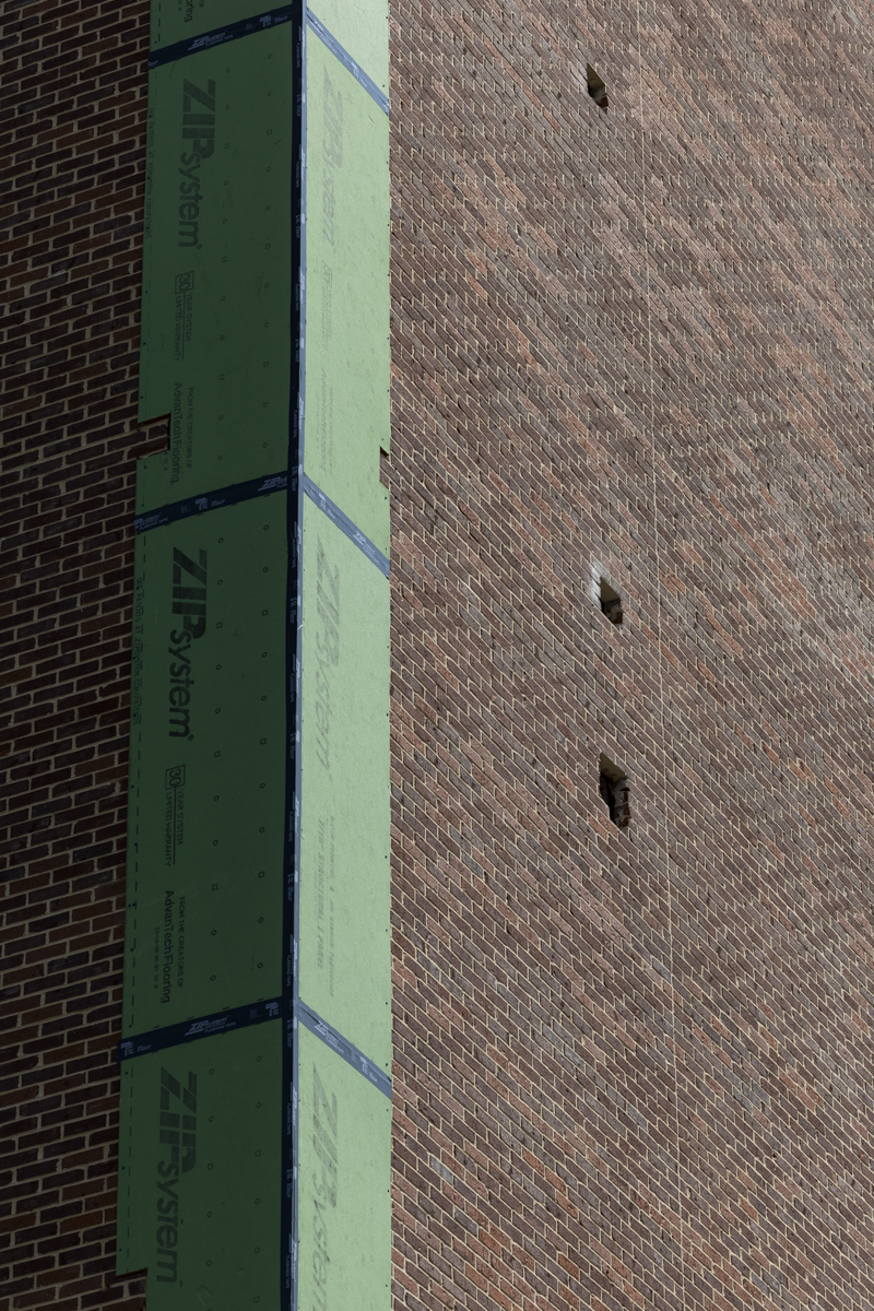 Masonry on Hilltopper Hall has been removed following construction and design issues with the building. Monday, Sept. 9, 2024.