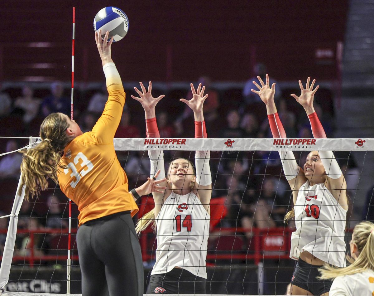 University of Tennessee outside hitter Hayden Kubik (33) spikes the ball over the net during a game against the University of Tennessee in Diddle Arena on Tuesday, Sept. 10, 2024. 