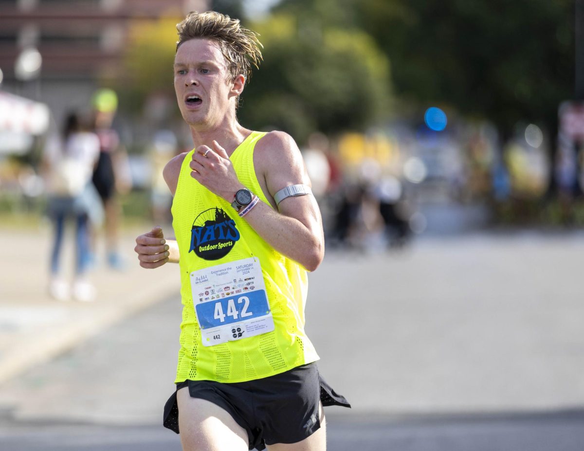 A runner enters the last stretch of the annual Med Center Health 10K Classic at WKU on Saturday, Sept. 14, 2023.