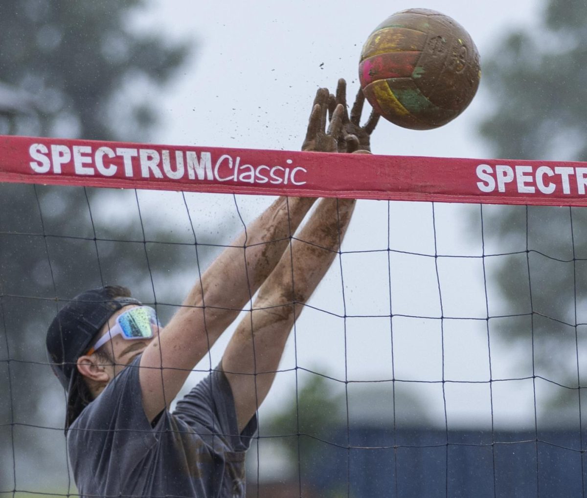 Ian Dambrowitz blocks a ball during the 6th annual Omega Phi Alphanmud volleyball tournament at Ephram White Park on Sept. 28, 2024. 