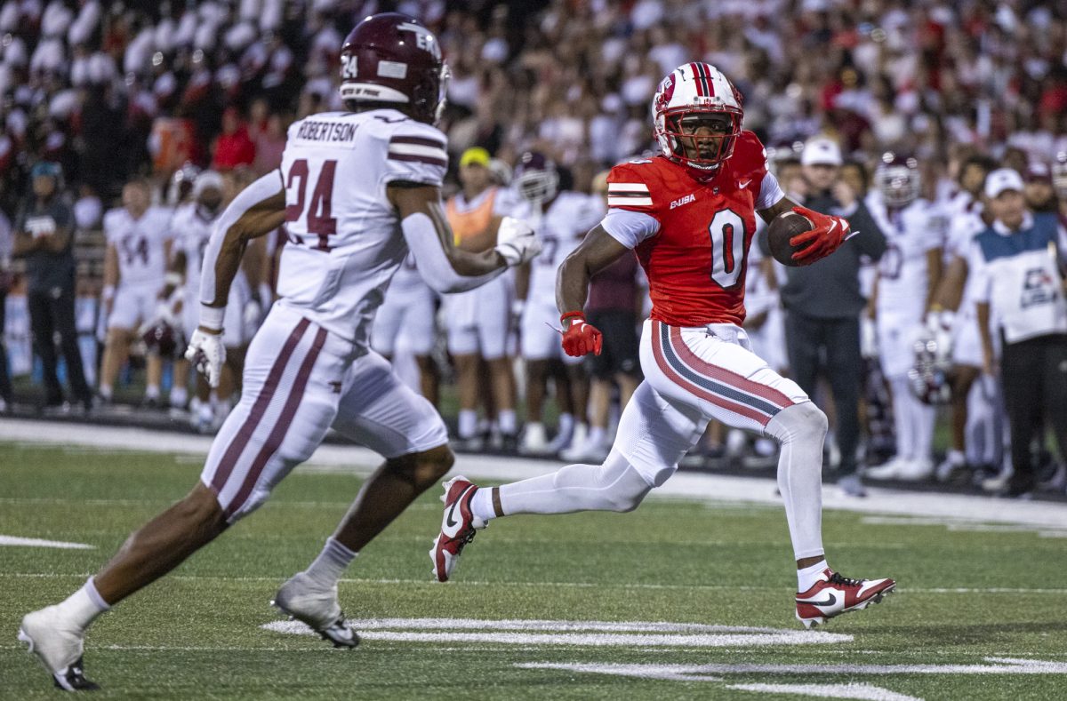 Western Kentucky Hilltoppers wide receiver Kisean Johnson (0) runs the ball during WKU's game against Eastern Kentucky University in Bowling Green on Saturday, Sept. 7, 2024.