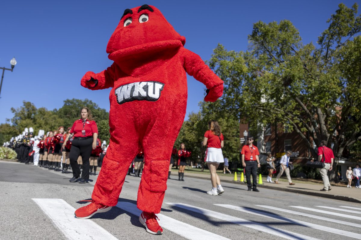 Big Red dances with the Big Red Marching Band before the Walk of Champions on Saturday, Sept. 7, 2024.