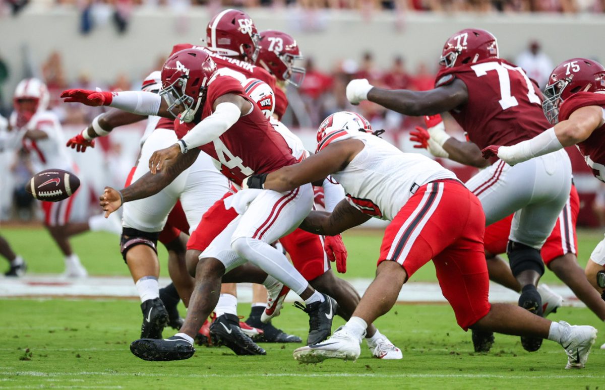 Western Kentucky defensive lineman Hosea Wheeler (0) strip sacks University of Alabama quarterback Jalen Milroe (4) during a game at Bryant Denning Stadium in Tuscaloosa, Ala. on Aug. 31, 2024.