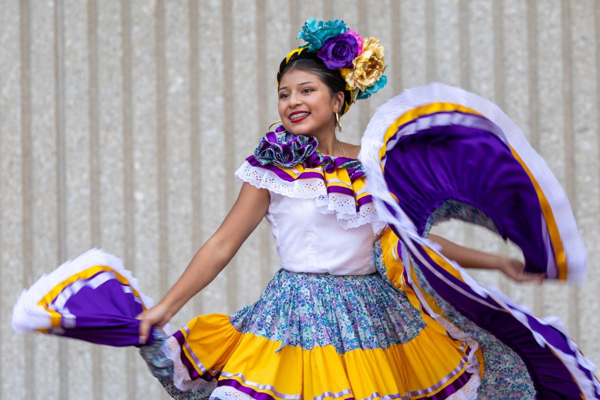 Ailyn Serrano dances during WKU's HOLAS All Around the World event on Monday, Sept. 16, 2024. 