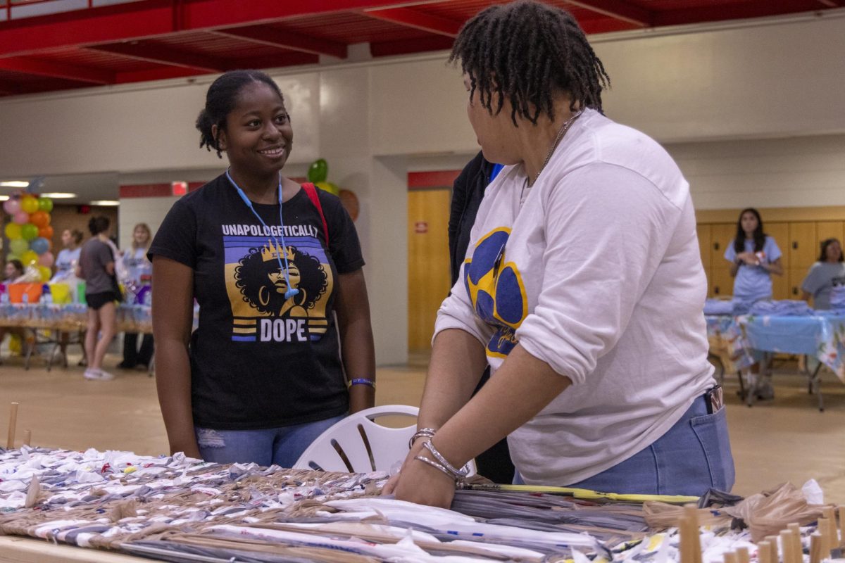 Senior Laila Bunton, left, and grad student Taliah Guthrie spend time talking to each other during the Healthy Days Student Health Fair at Raymond B. Preston Health and Activities Center on Wednesday, Sept. 18, 2024. 