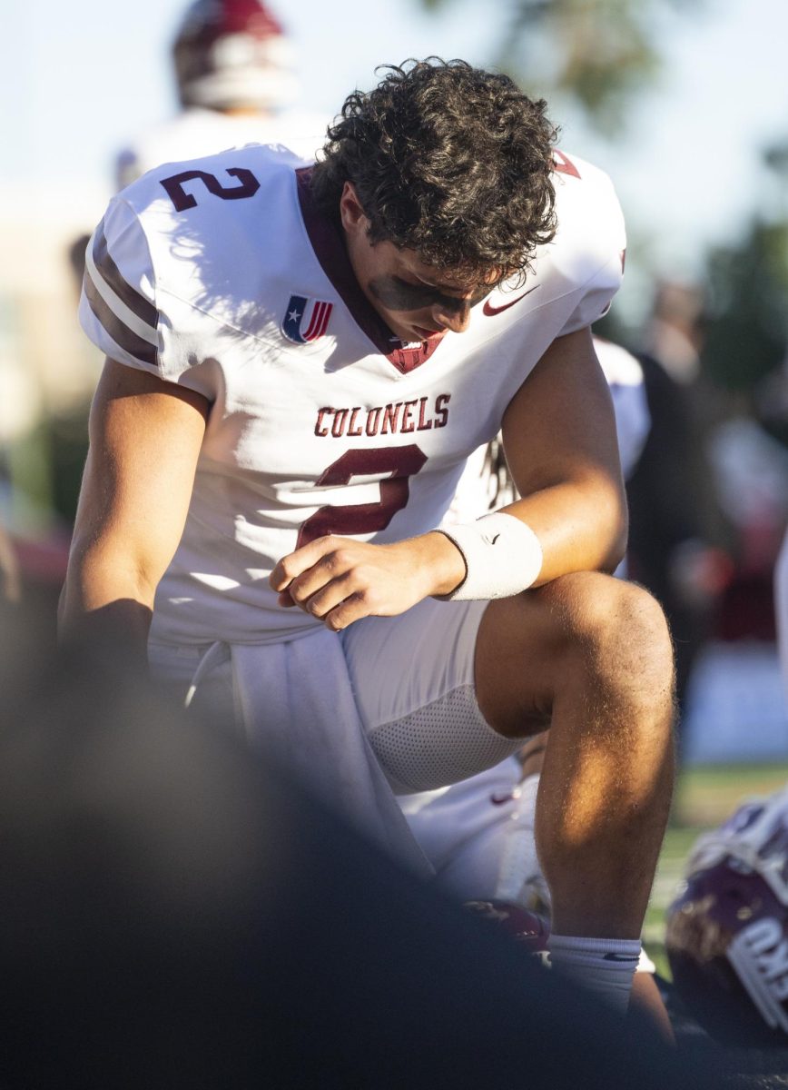 Eastern Kentucky Colonels quarterback Cameron Hergott (2) prays prior to his game at L.T. Smith Stadium against Western Kentucky University on Saturday, Sept. 7, 2024. 