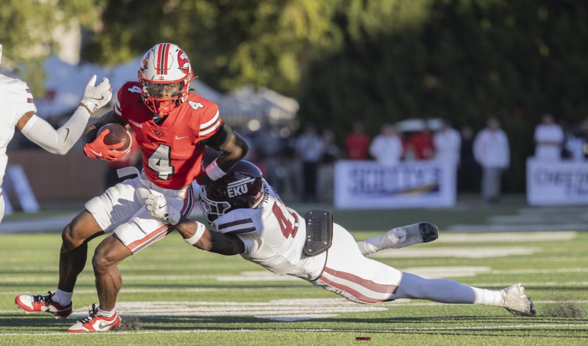 Western Kentucky Hilltoppers wide receiver Michael Mathison (4) attempts to break a tackle from Eastern Kentucky Colonels linebacker Jacquez McGowan (47) during a game at L.T. Smith Stadium on Saturday, Sept. 7, 2024. 