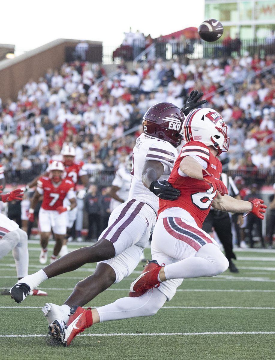 Western Kentucky Hilltoppers wide receiver Easton Messer (8) attempts to reach past the defense during a game at L.T. Smith Stadium against Eastern Kentucky University on Saturday, Sept. 7, 2024.