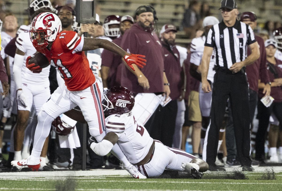 Western Kentucky Hilltoppers wide receiver Koy Moore (11) attempts to outrun the defense during a game at L.T. Smith Stadium against Eastern Kentucky University on Saturday, Sept. 7, 2024. 