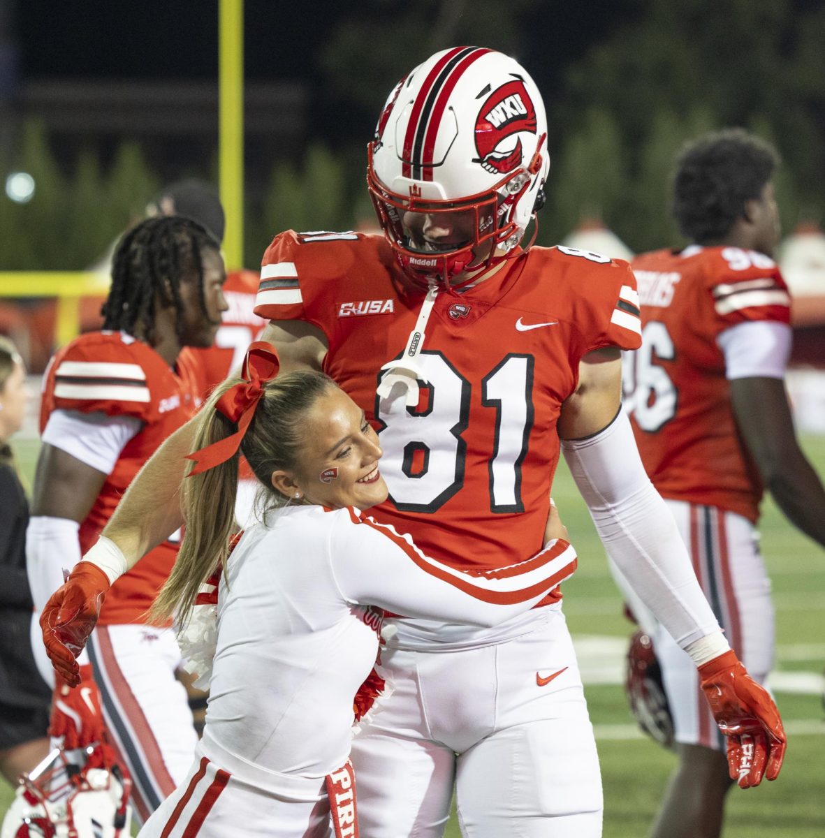 Amanda Hambly hugs Western Kentucky Hilltoppers tight end Noah Meyers (81) after a game at L.T. Smith Stadium against Eastern Kentucky University on Saturday, Sept. 7, 2024. 