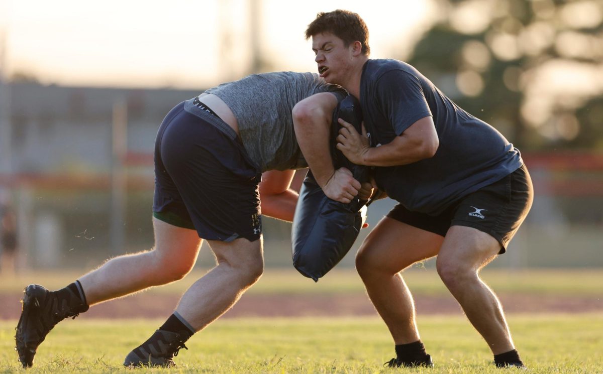 Clayton Hockman (left) and Max Lawrie run through drills during a practice on Tuesday, Sept. 10, 2024. 