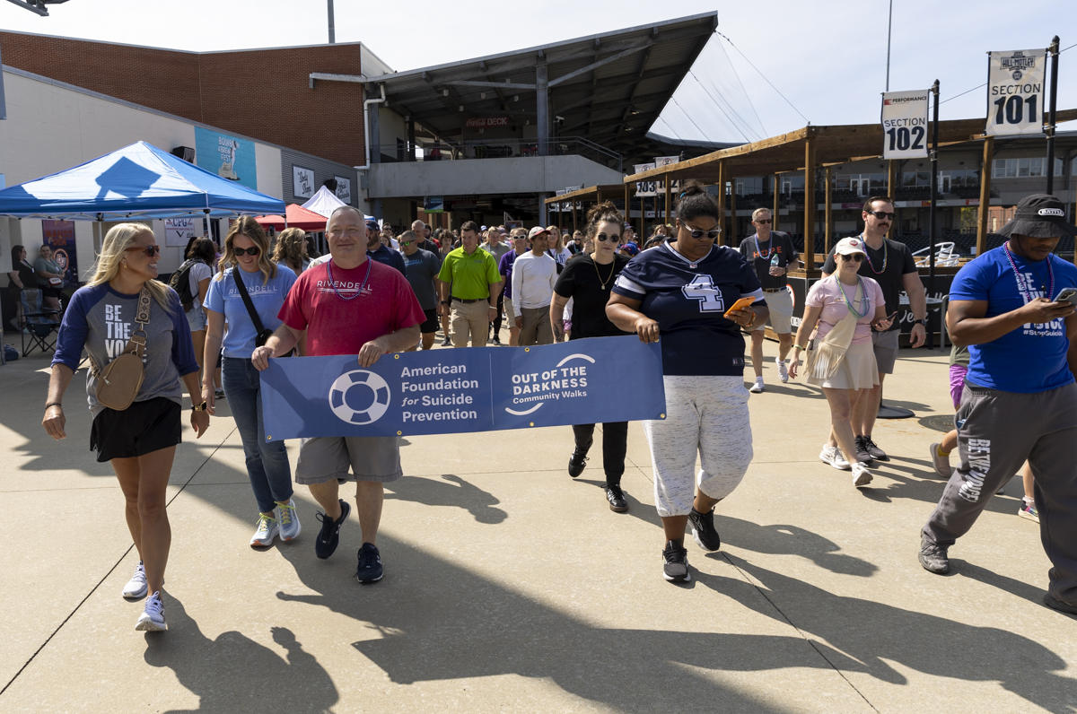 The Out of the Darkness Walk begins on the concourse of the Bowling Green Ballpark on Sunday, Sept. 8, 2024.