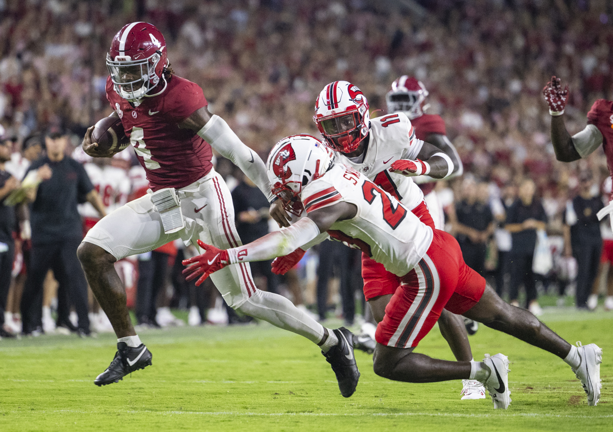 Alabama Crimson Tide quarterback Jalen Milroe (4) rushes into the end zone for a touchdown during a game against the University of Alabama at Bryant Denning Stadium in Tuscaloosa, Ala. on Saturday, Aug. 31, 2024.