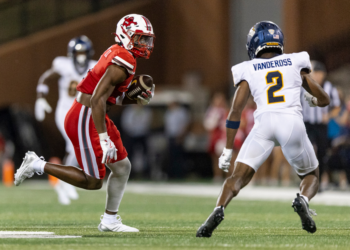 Western Kentucky Hilltoppers running back George Hart III (9) rushes with the ball during a game against the University of Toledo at L.T.  Smith Stadium on Saturday, Sept. 21, 2024.