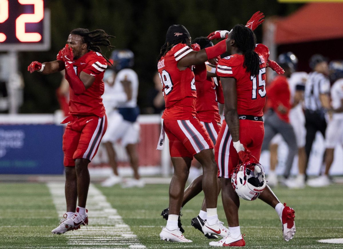 Western Kentucky University football players celebrate their win after the game against University of Toledo at L.T. Smith Stadium on Saturday, Sept. 21, 2024.