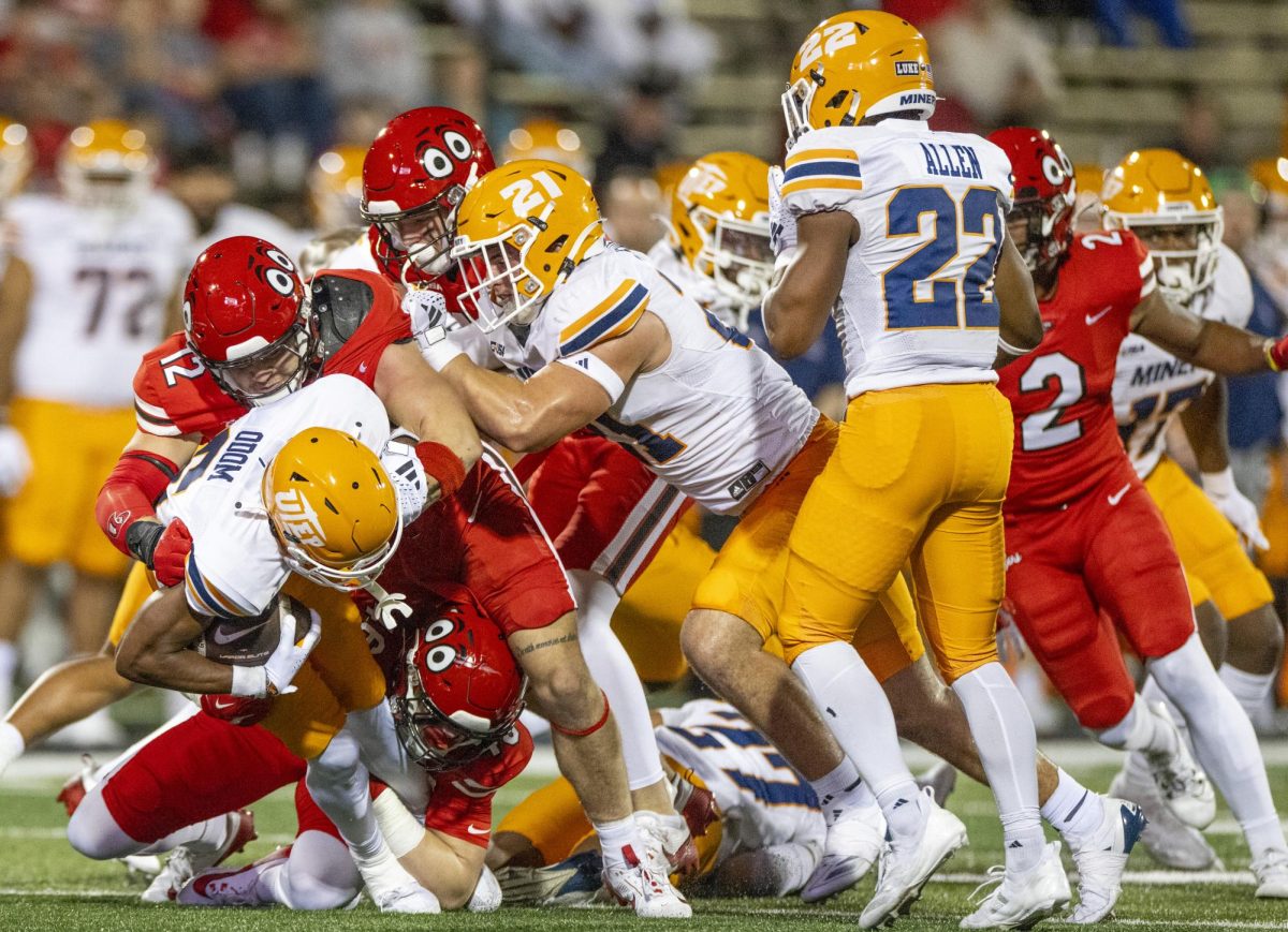 Western Kentucky Hilltoppers linebacker Chandler Matthews (12) tackles University of Texas El Paso Miners wide receiver Kenny Odom (6) during WKU’s game against The University of Texas at El Paso in Bowing Green, Ky. on Thursday, Oct. 10, 2024. 