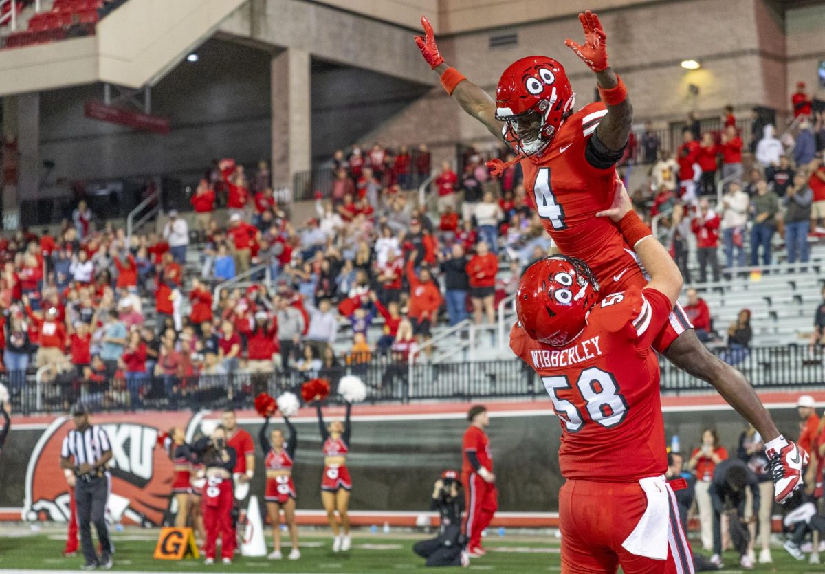 Western Kentucky Hilltoppers wide receiver Michael Mathison (4) celebrates his touchdown with offensive lineman Evan Wibberley (58) during WKU’s game against The University of Texas at El Paso in Bowing Green, Ky. on Thursday, Oct. 10, 2024. 