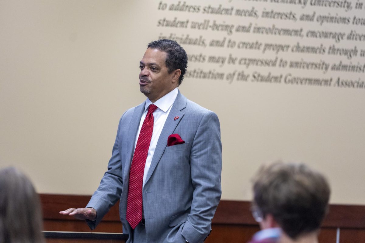 Sedrik Newbern, Alumni Association president speaks to the Student Government Association on Oct. 15 2024 in the Senate Chambers in Downing Student Union. 