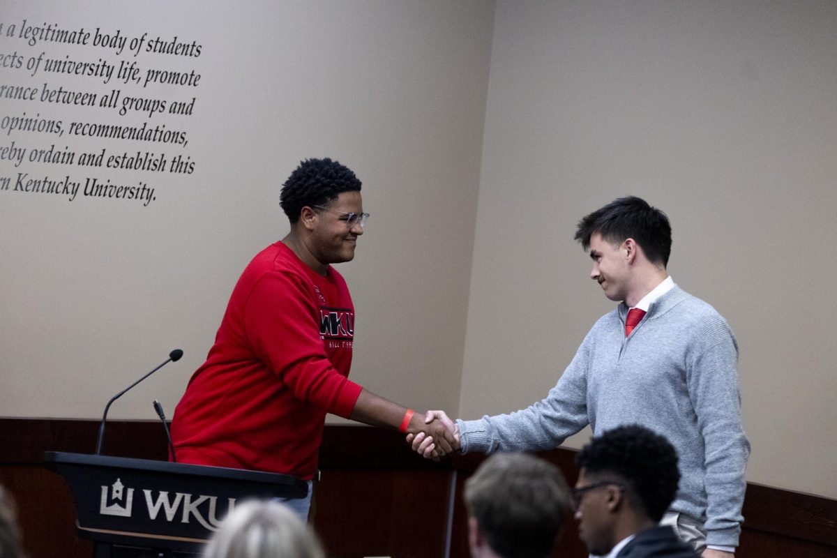 Demani Bell is sworn into the Student Government Association as a senator-at-large on Oct. 15, 2024 in the Senate Chambers in Downing Student Union.