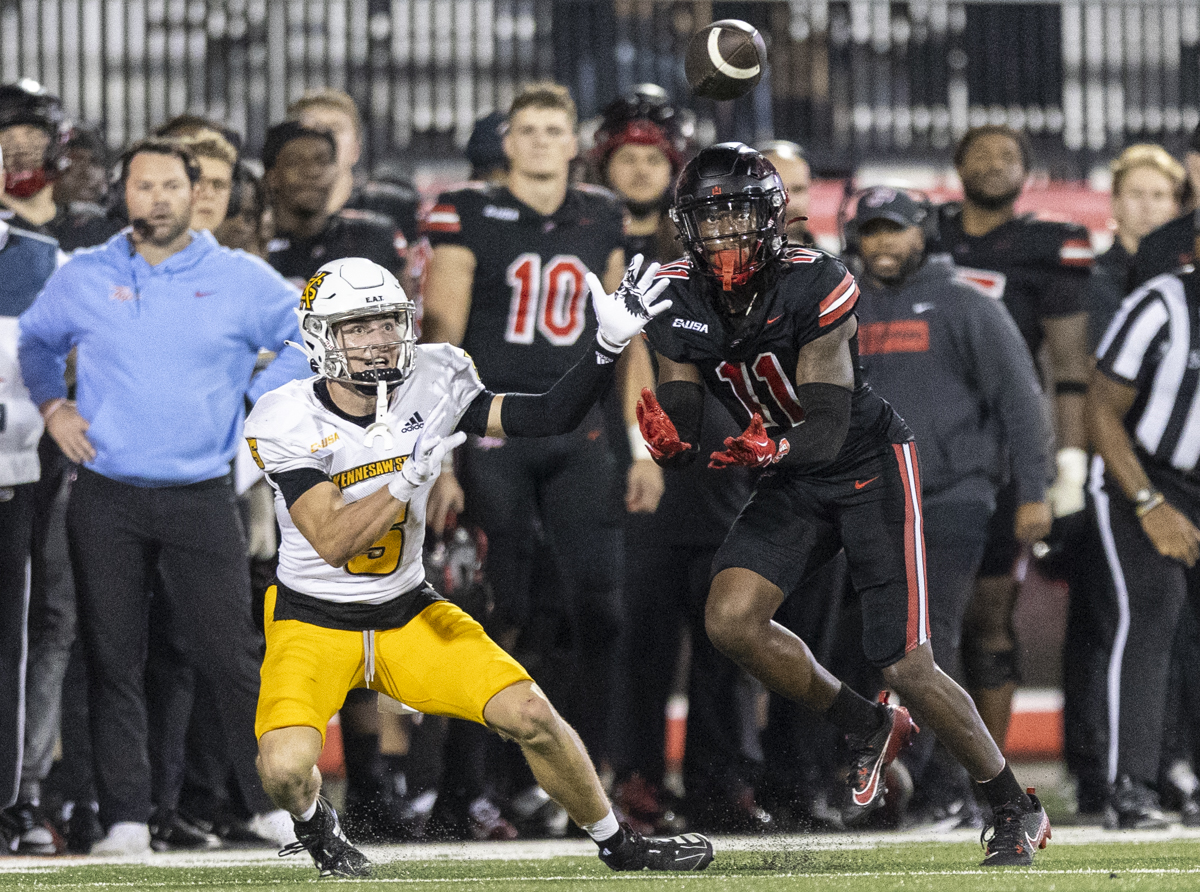 Western Kentucky Hilltoppers wide receiver Koy Moore (11) prepares to intercept a Kennesaw State University pass at L.T. Smith Stadium on Wednesday, Oct. 30, 2024. Moore successfully intercepted the pass.