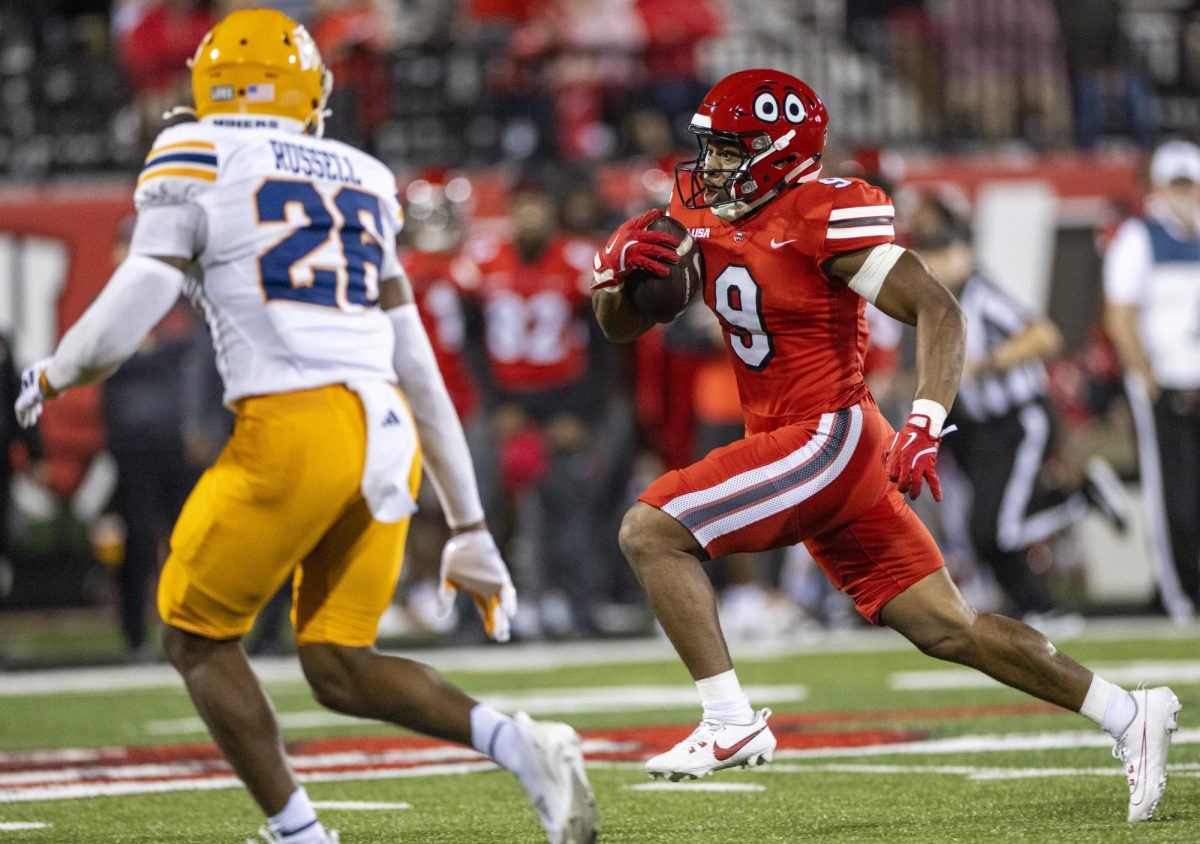 Western Kentucky Hilltoppers running back George Hart III (9) runs the ball during WKU’s game against The University of Texas at El Paso in Bowing Green, Ky. on Thursday, Oct. 10, 2024. 