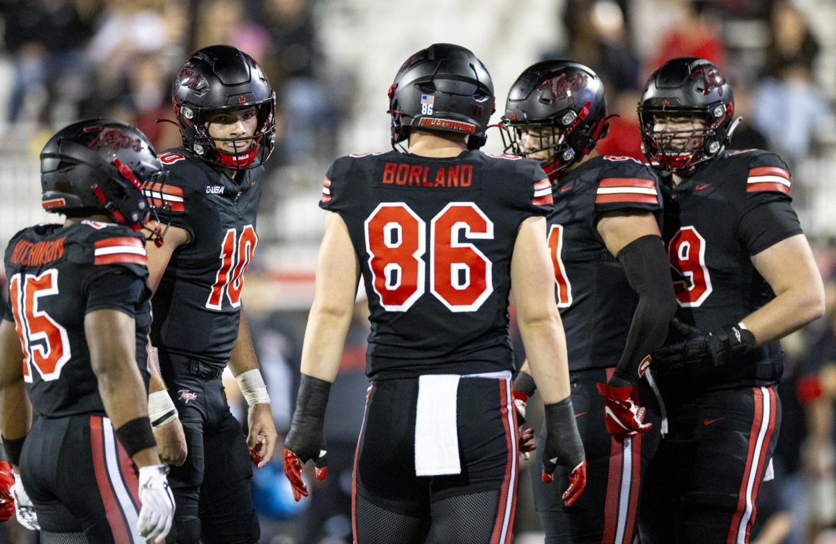 Western Kentucky Hilltoppers quarterback Caden Veltkamp (10) talks to his team during WKU’s game against Kennesaw State University in Bowling Green, Ky. on Wednesday, Oct. 30, 2024.