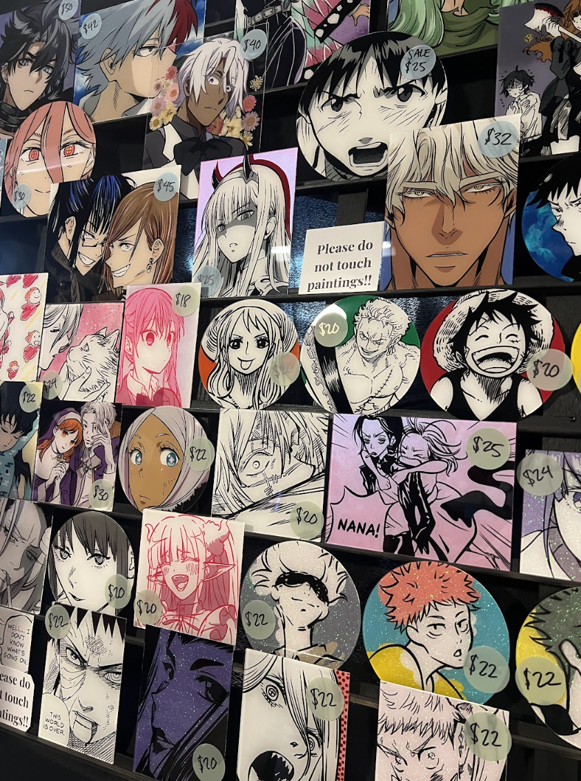 Paintings on display at the Bowling Green Anime-Fest in the Corvette Museum on Sunday, Oct. 20