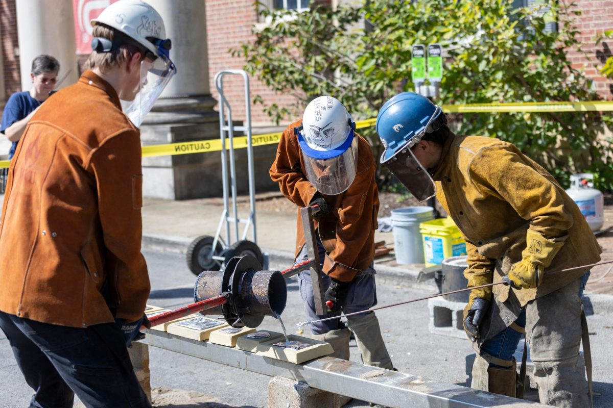 The WKU League Of Sculptors Make metal art with molds for people who donate money to help fund their club at "Hammer-In" on Oct. 12, 2024.  