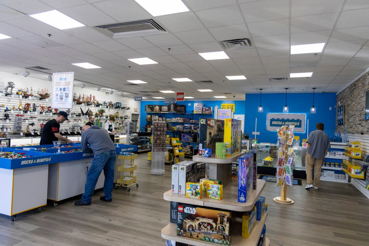 Customers shop at the new Bricks & Minifigs in Bowling Green on Oct. 10, 2024.