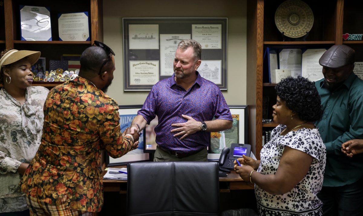 Alcott shakes hands with Congolese Community Advisor Faustin Kaganda after a meeting with Congolese community leaders in his City Hall office on Sept. 23, 2024. Community leaders discussed the Congolese community’s concerns with Alcott and asked for the city’s aid. “I think we can learn from each other,” Alcott said to the group. “We’re proud that you are apart of our community.”