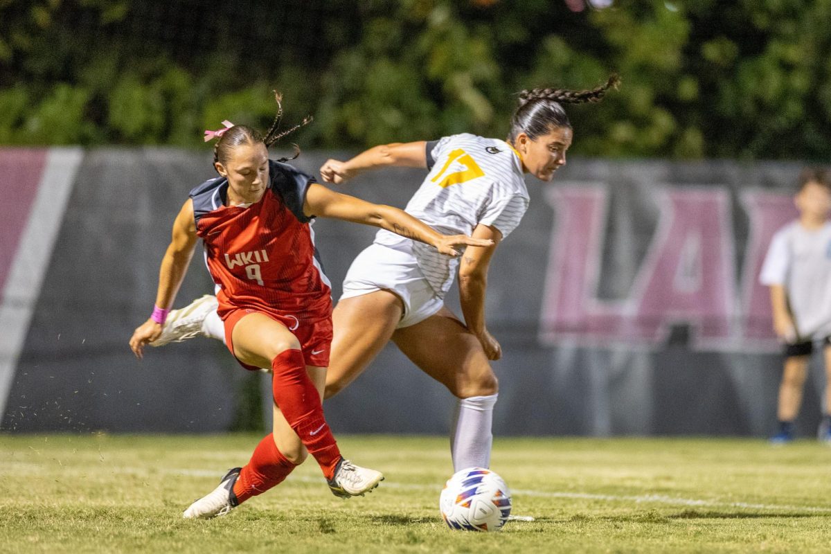 Western Kentucky Hilltoppers midfielder Maggie Morris (9) fights for the ball with Kennasaw State defender Jade Barkett (17) during their match on Oct. 3, 2024 at the WKU Soccer Complex. The Lady Toppers drew a tie with the Owls. 