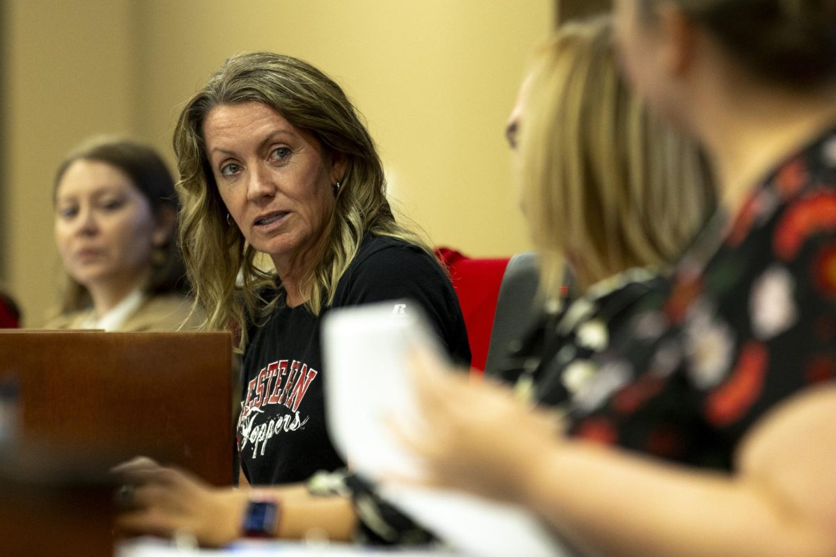 Vice Chair of staff senate Leslie Vanderpool discusses future senate meetings and upcoming events with Secretary Morgan Moran during this months staff senate meeting in the Senate chambers on Wednesday, Oct. 2, 2024.