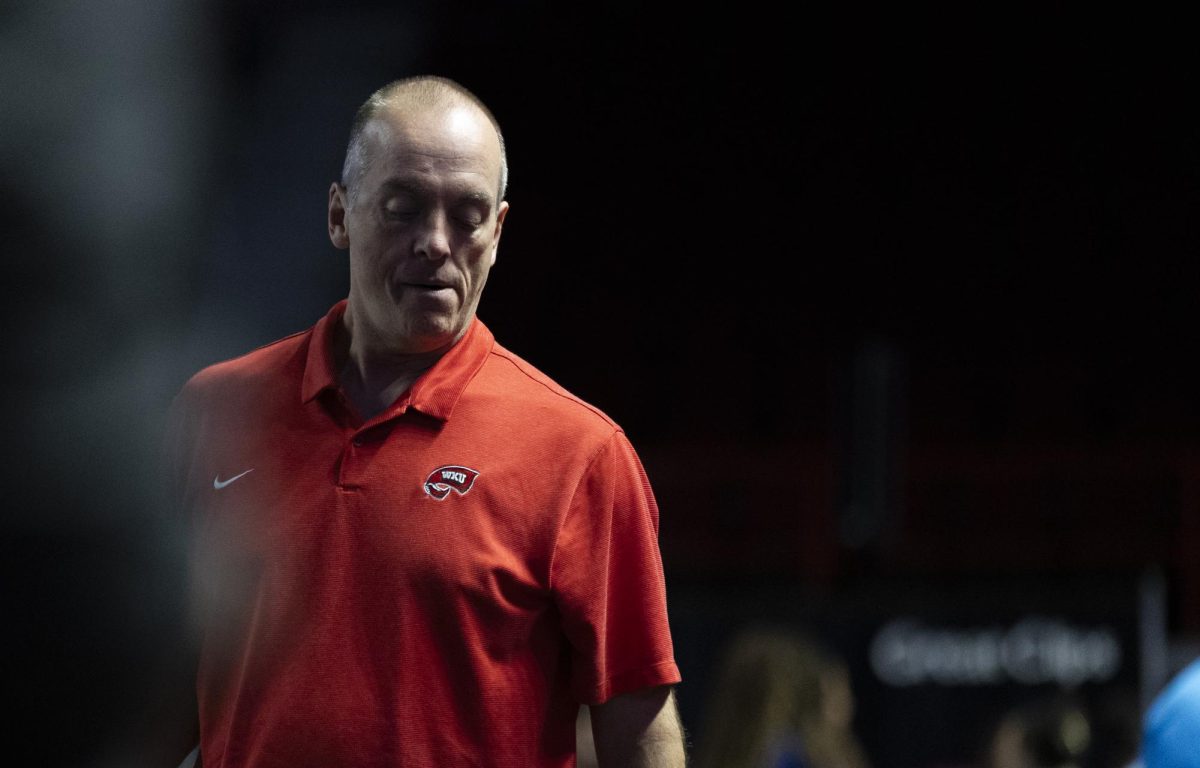 WKU volleyball head coach Travis Hudson prepares for a time out during WKU’s 3-0 sweep of Louisiana Tech on Saturday, Oct. 19, 2024 in Diddle Arena. 