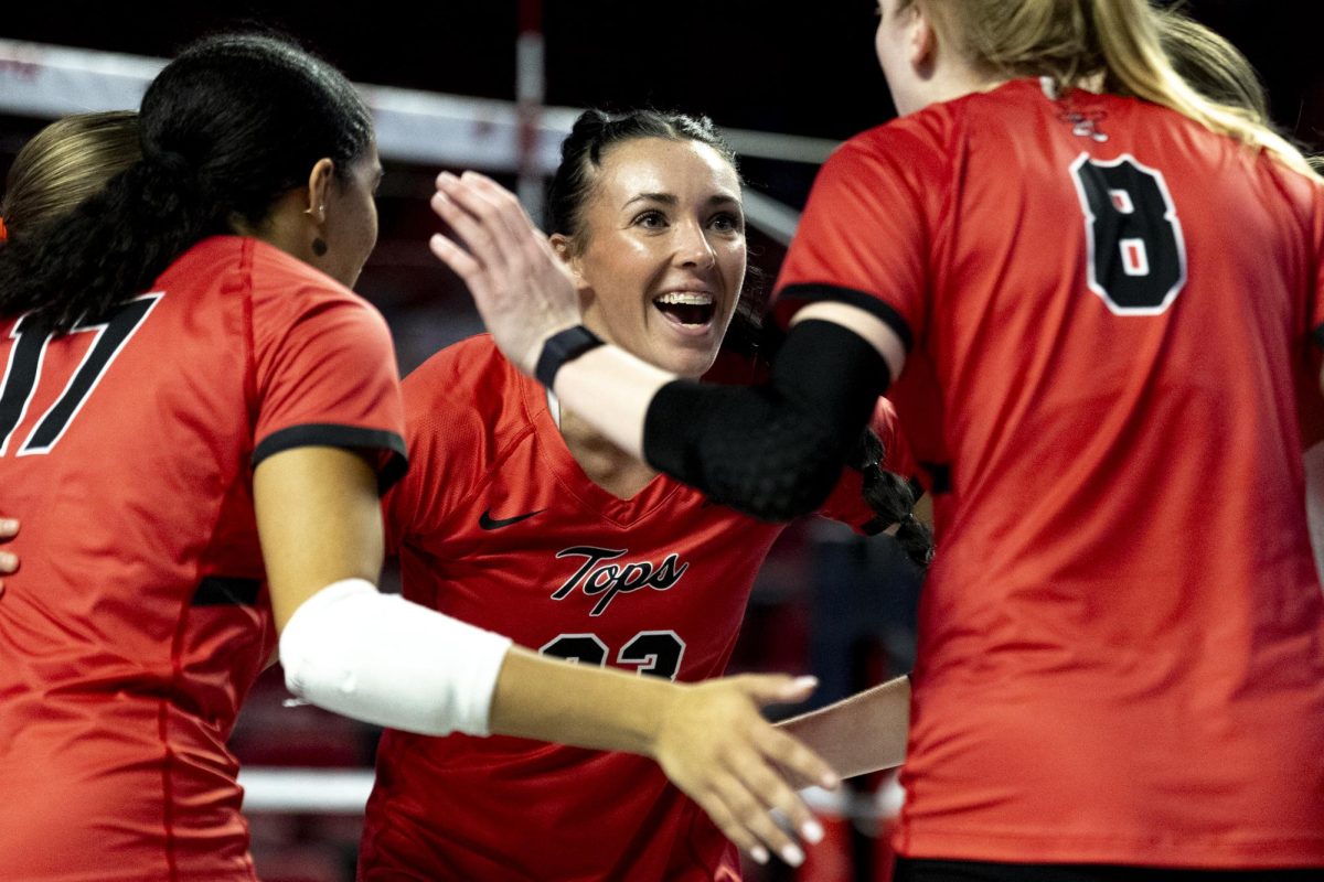 Right side hitter Kenadee Coyle (33) celebrates a kill with her teammates during WKU’s 3-0 sweep of Louisiana Tech on Saturday, Oct. 19, 2024 in Diddle Arena. Coyle had 9 kills for the day, contributing to Western’s 13 game win streak this season. 