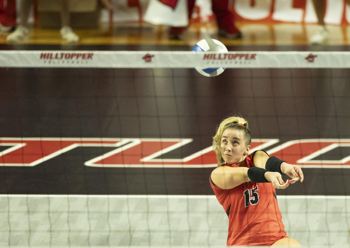 Western Kentucky University defensive specialist Abby Schaefer (15) digs a ball during a match against New Mexico State University on Friday, Nov. 1, 2024. 