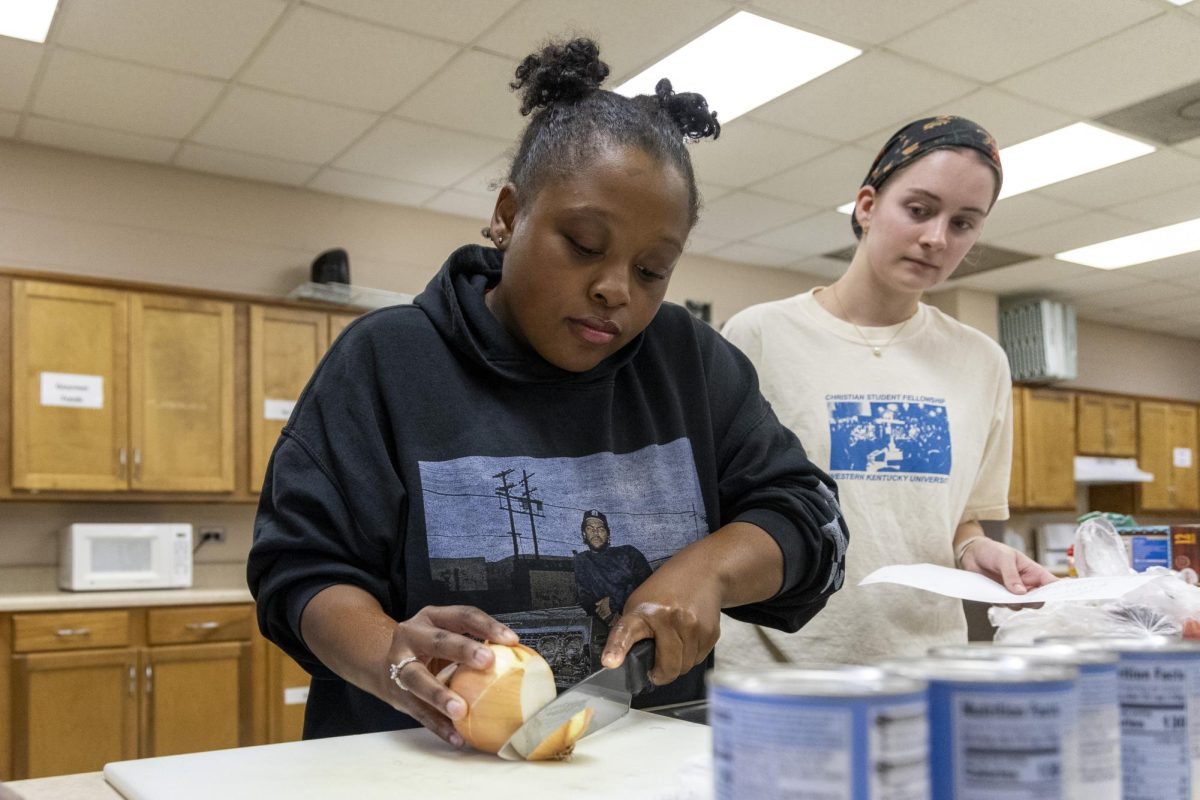 Georgia brown dices an onion during the Topper Chef event hosted by SGA on Monday, Nov. 4, 2024. 