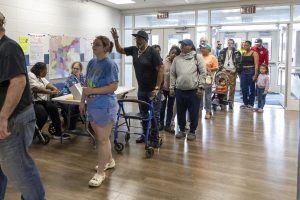 Voters wait in line during the last day of voting on Tuesday, Nov. 5, 2024 at Warren Central High School in Bowling Green. 