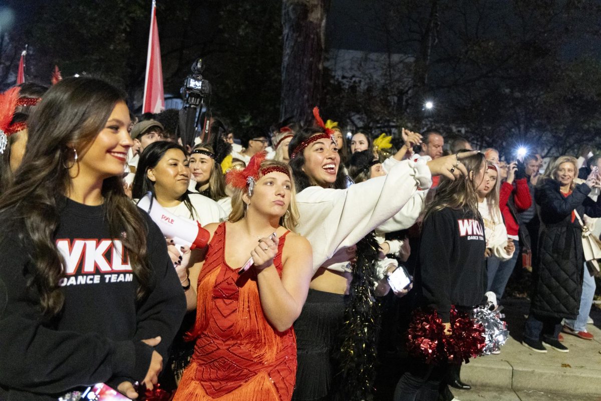 Mia Morales (left) and Layne Pea, members of Chi Omega, dance during the Big Red Roar event during WKU’s Homecoming Friday, Nov. 15, 2024.