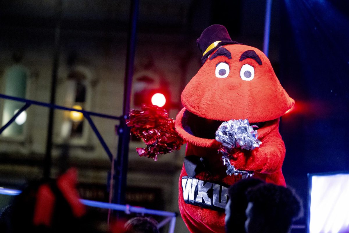 Big Red dances on stage at the Big Red Roar event  after WKU’s Homecoming Parade Friday, Nov. 15, 2024.