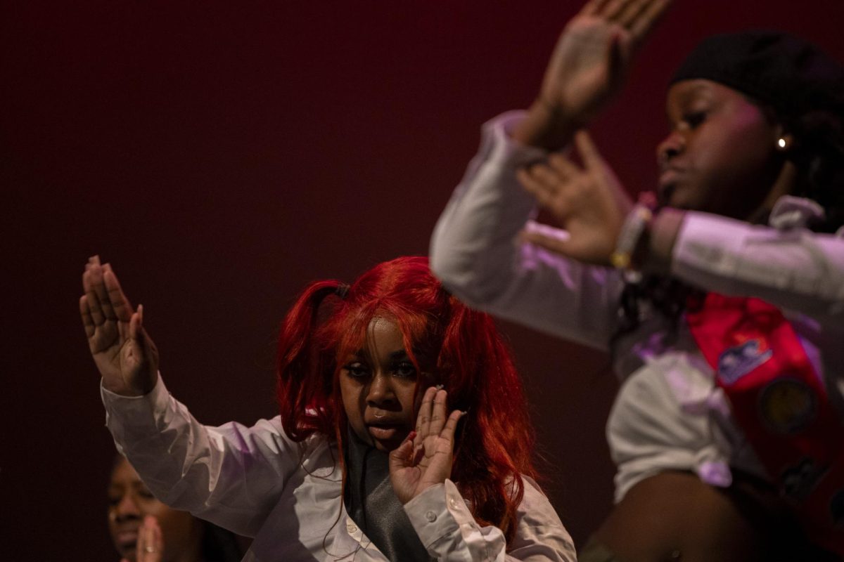 Myrion Campbell, member of Kaois Dance Company dances at WKU’s annual Homecoming Step Show at the Capitol Theater on Saturday, Nov. 16, 2024.