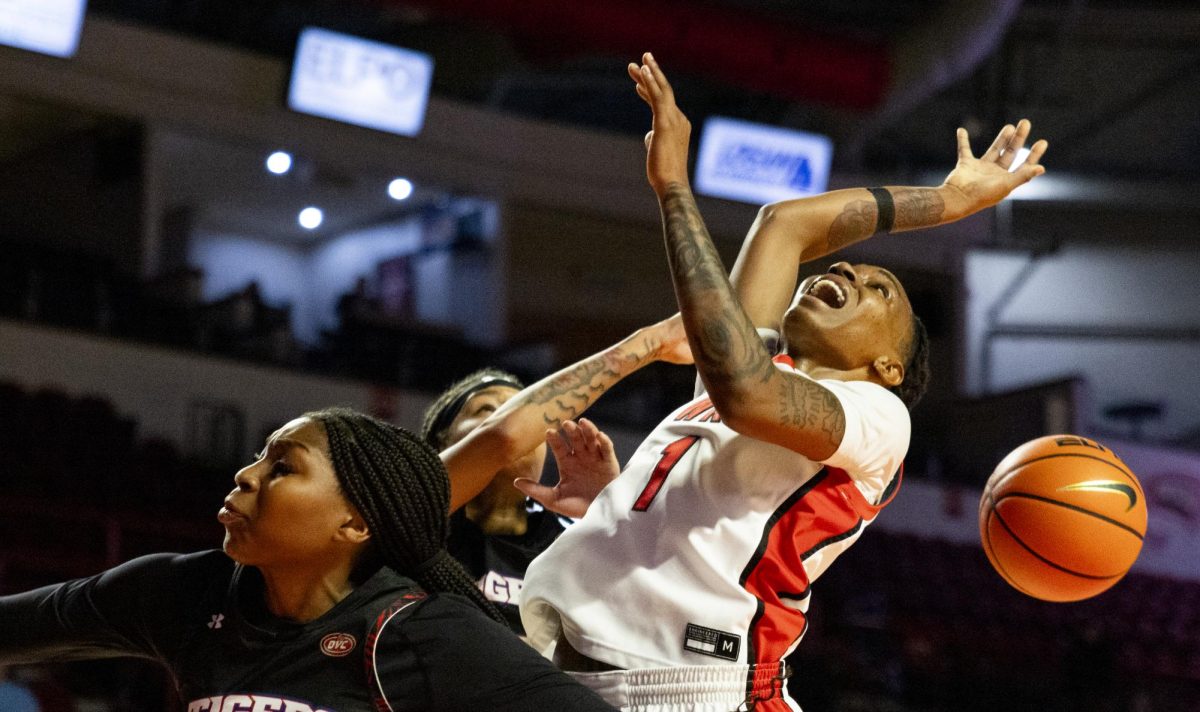 WKU guard Destiny Salary (1) struggles with defenders during the Lady Toppers game against Tennessee State University in Bowing Green, Ky. on Wednesday, Nov. 27, 2024.