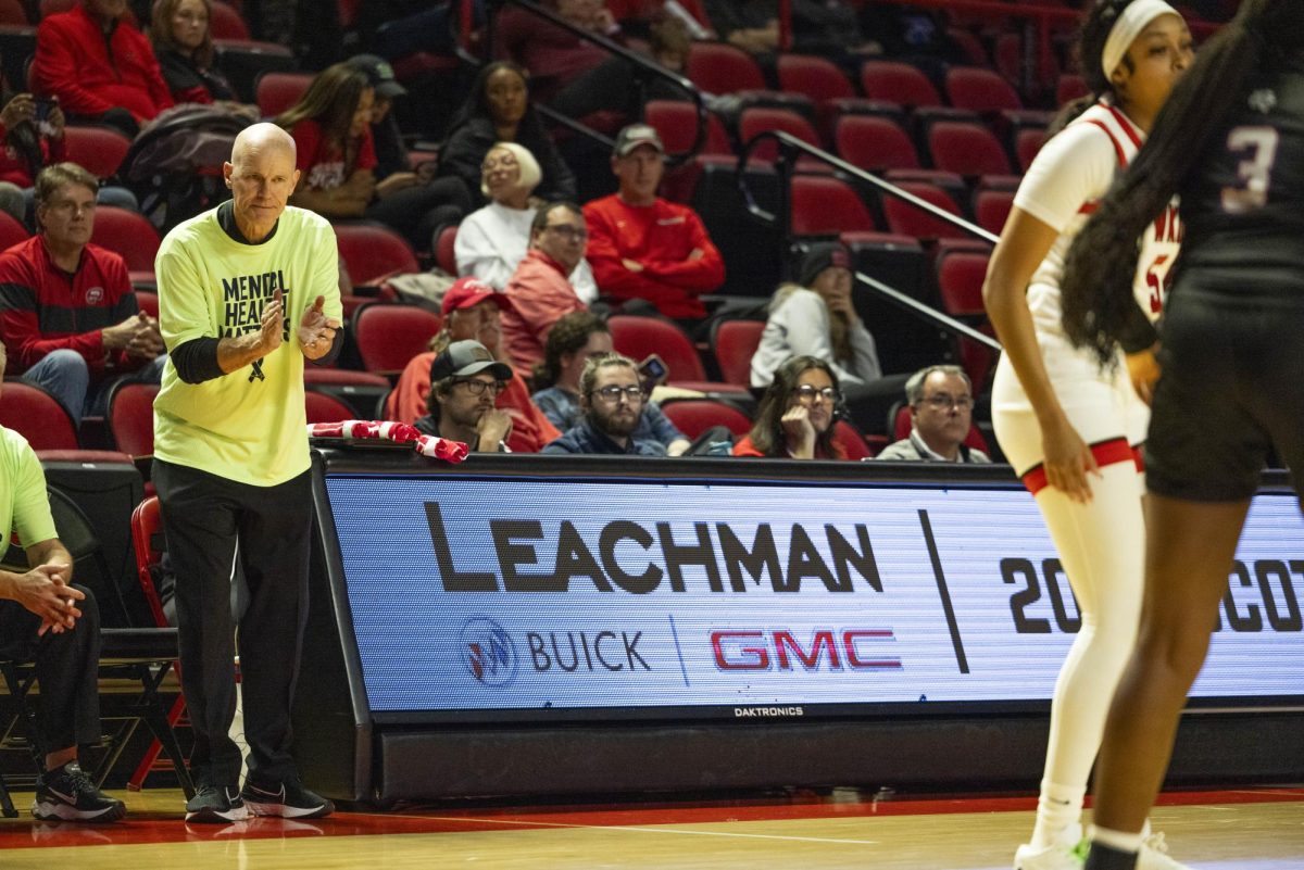 WKU head coach Greg Collins applauds his team during the Lady Toppers game against Tennessee State University in Bowing Green, Ky. on Wednesday, Nov. 27, 2024.