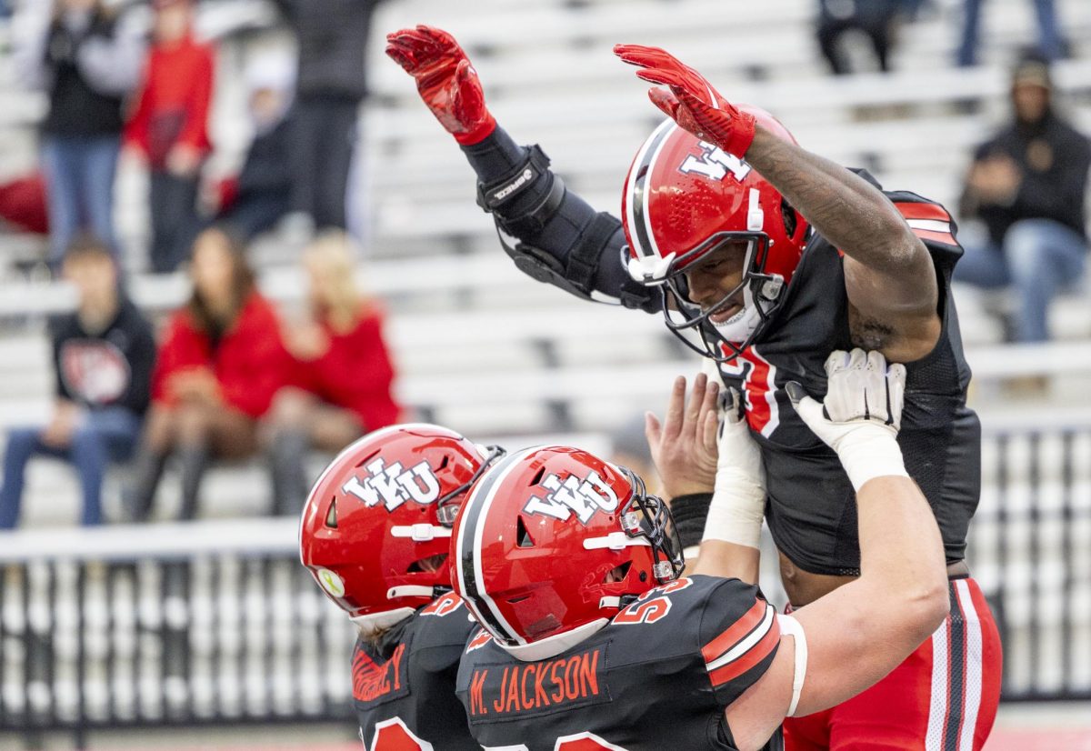 Western Kentucky Hilltoppers running back Elijah Young (3)celebrates with teammates during WKU's game against Jacksonville State University in Bowing Green, Ky. on Saturday, Nov. 30, 2024.