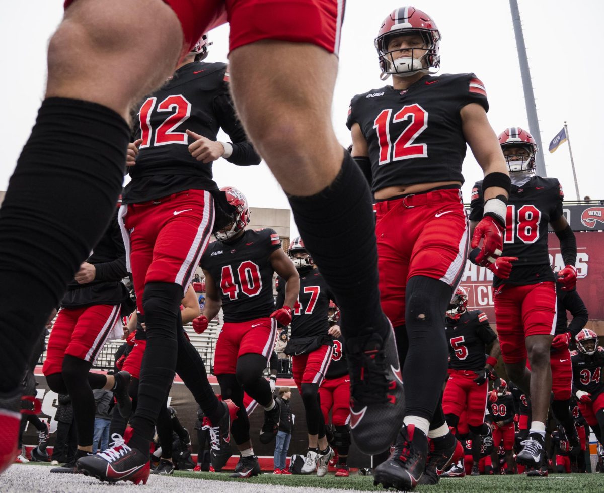 The Hilltoppers storm onto the field to kick off WKU’s game against Jacksonville State University in Bowing Green, Ky. on Saturday, Nov. 30, 2024. 